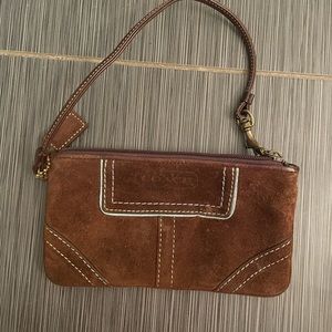 Coach brown suede with light blue accent wristlet